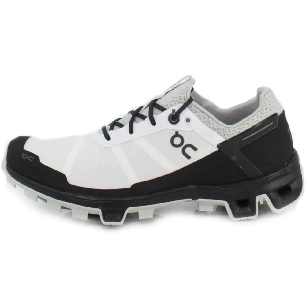 On Running White and Black Athletic Shoes